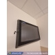 A wall-mounted autism TV protection cabinet in a hospital