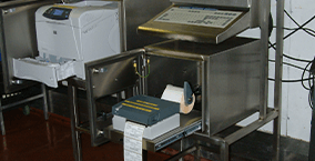 A food label printer in an Armagard washdown printer enclosure
