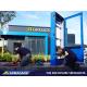 Armagard engineers installing the Greggs outdoor digital menu display in a drive thru