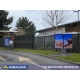 Two dual-screen McDonald's outdoor digital menu boards with Samsung OH displays
