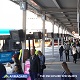 Pole-mounted outdoor LCD passenger information displays at a bus station