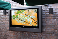 armagard outdoor tv enclosure mounted on a patio wall