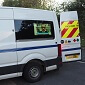 Armagard van-side LED display 24" in a work van with open rear doors