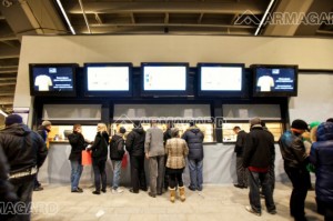 armagard enclosures mounted above a sales area in a sports arena