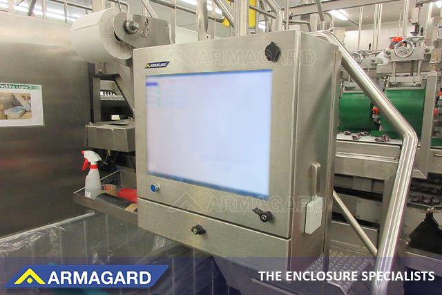 stainless-steel PC HMI enclosure installed on a food production line